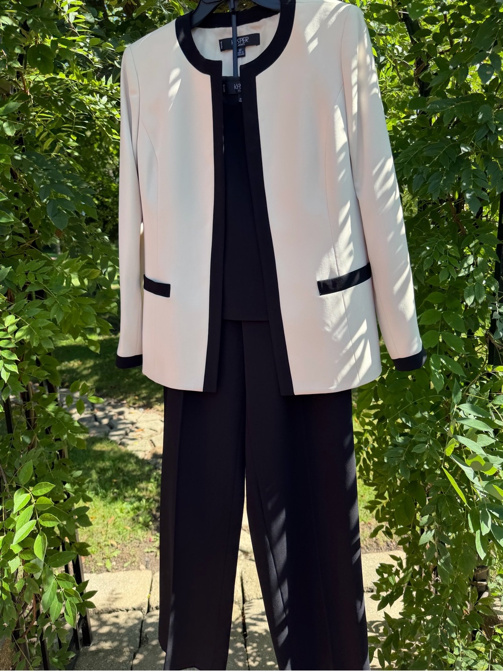 Kasper Cream and Black 3 pieces suit.Pants, jacket, and tank top. Size 6P.